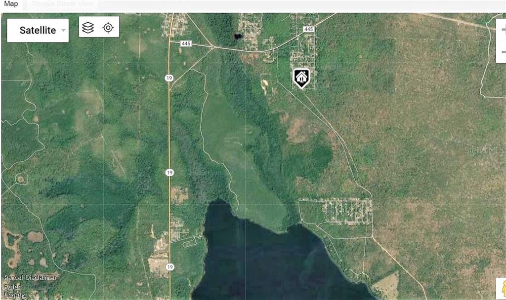 generic satellite map shows the house location in relation to Lake Dorr andf the Ocala National Forest
