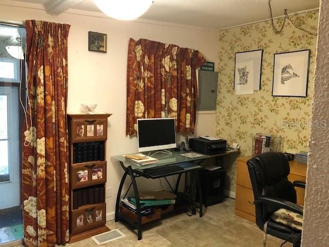 Dining Area currently used as an office. In years past, seller said it had been a bedroom.