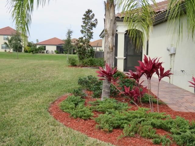 End unit with beautiful landscaping