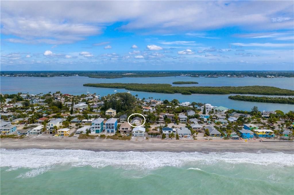 Across the street from the beach with deeded beach access -  Lemon Bay in the back which is  part of the intracoastal waterway.