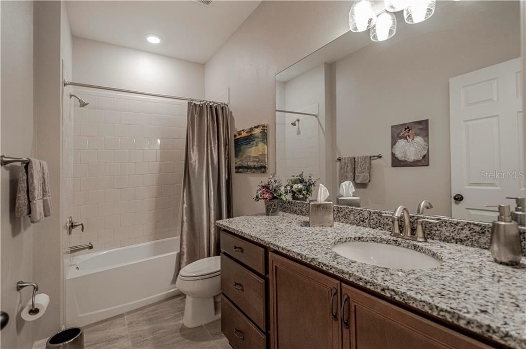 Guest bathroom with granite counters