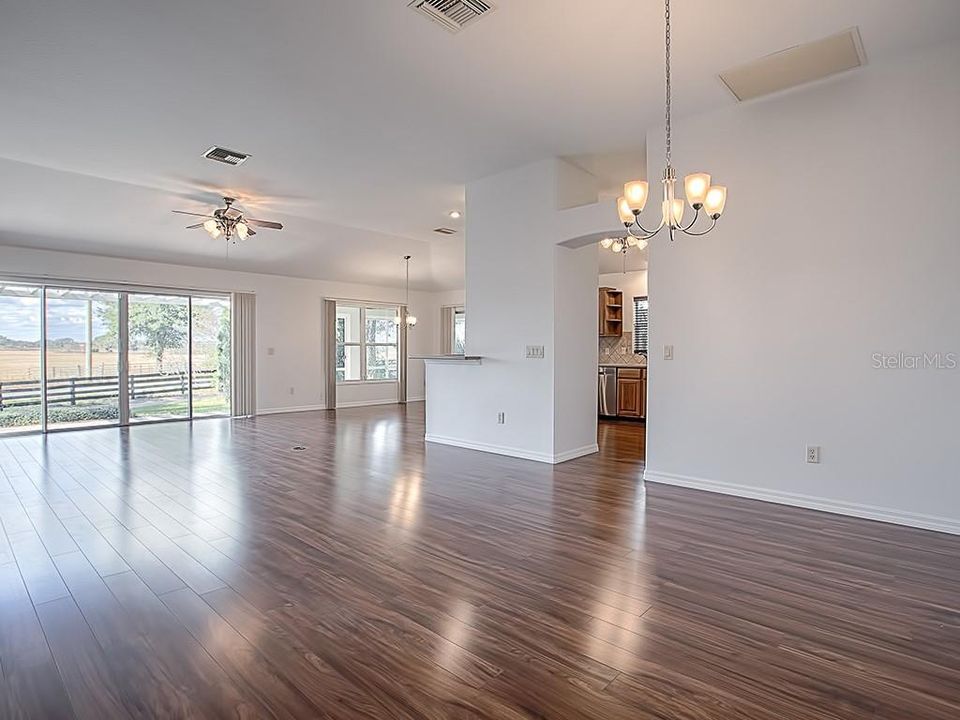 SPECTACULAR NEW ACACIA LAMINATE FLOORING THROUGHOUT THE ENTIRE HOME, EXCLUDING THE BATHS AND LAUNDRY ROOM!