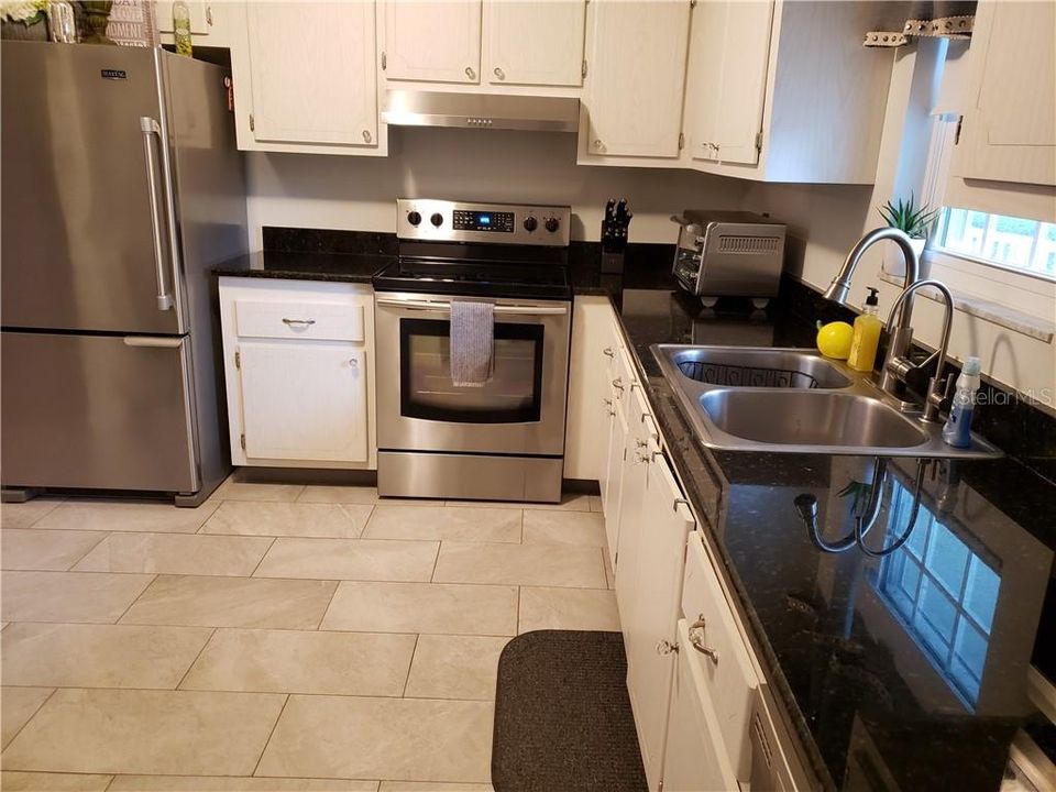 Stainless Steel Appliances with Granite Counter tops.