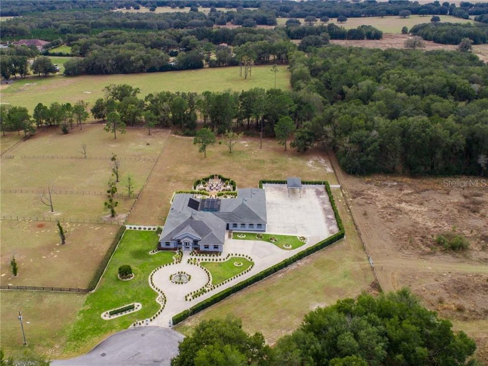 Beautiful Estate nestled on 3.15 private acres and Zoned Agricultural/Residential. Your Horses and chickens are welcome!