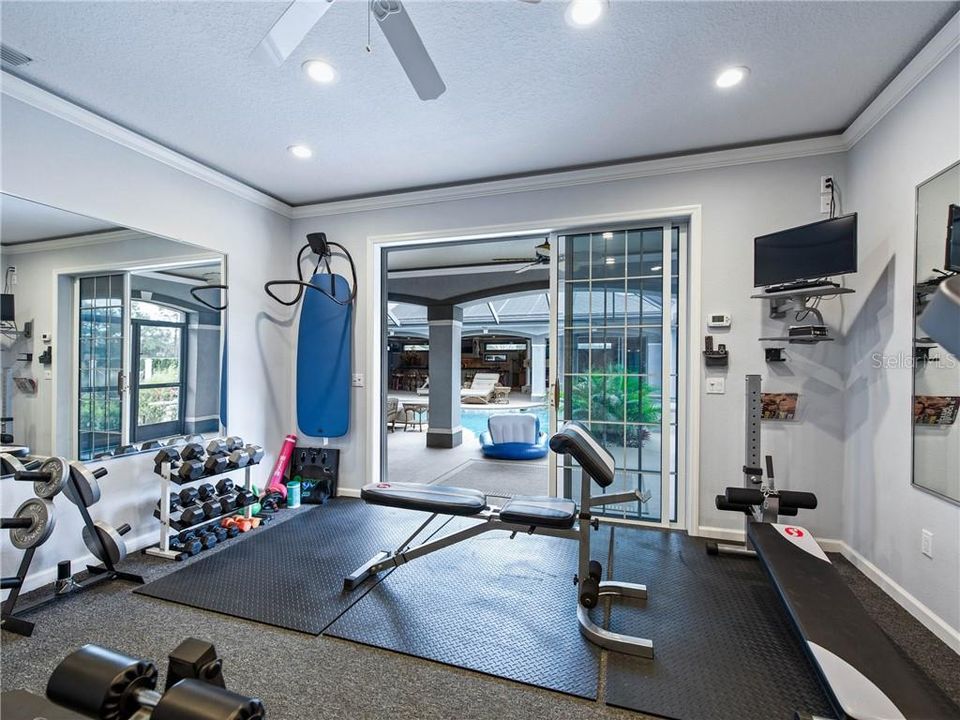 Fully equipped Personal Home Gym with Dynamite view of the pool and spa!