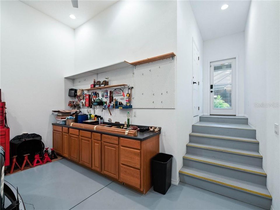 4'-0" wide Oversized stairwell leading up to the current Home office and out to the Covered Lanai/Pool