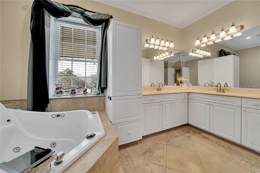 Master bathroom, cabinet linen closet