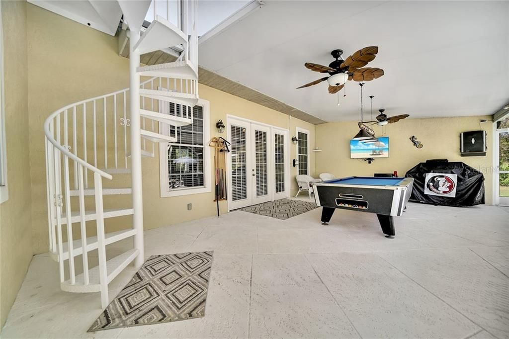 Spiral staircase from master bedroom to Lanai