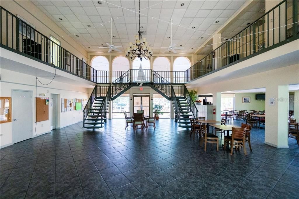Inside the club house - to the right is the restaurant, to the left is the fitness room.  Upstairs hosts a library, game room, private room with kitchen overlooking the pool.