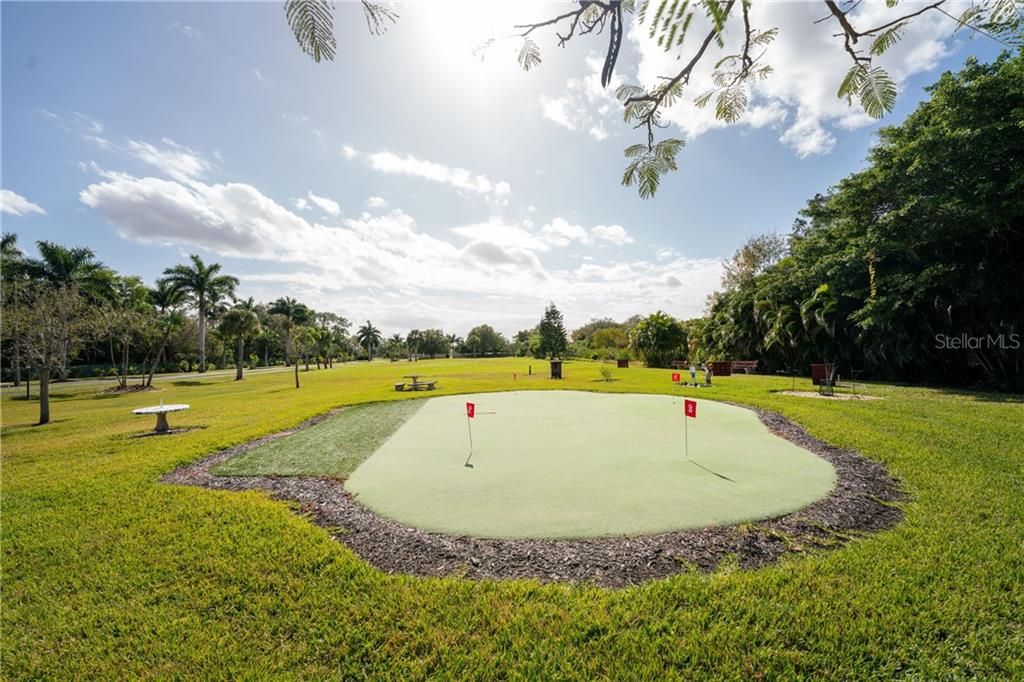 Putting green near entrance to Emerald Pointe