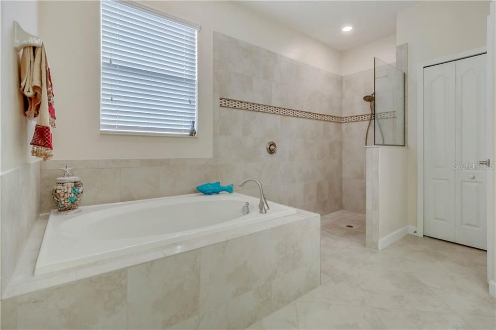 Master Bathroom features a Soaking Tub & Handicapped Accessible Shower