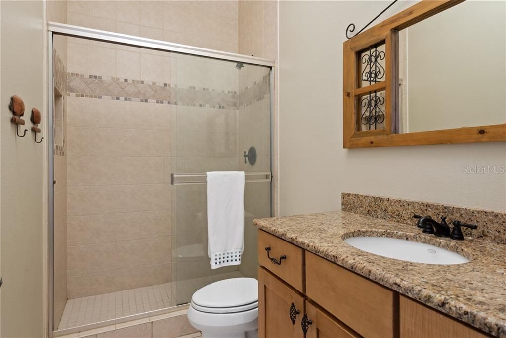 Like much of the house, upgraded features including Granite Counter top and full bath.