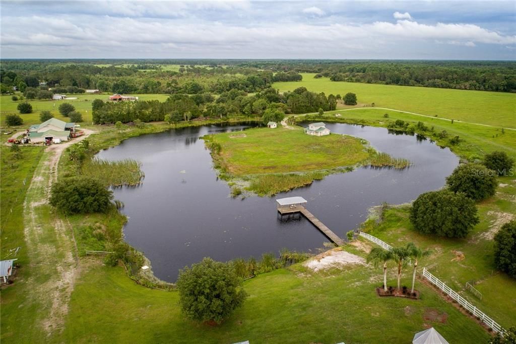 Seller stocked Horseshoe Lake with dock.