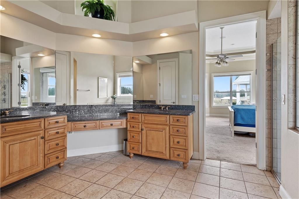 Spacious Master Bath with separate shower, garden tub, linen and water closet.