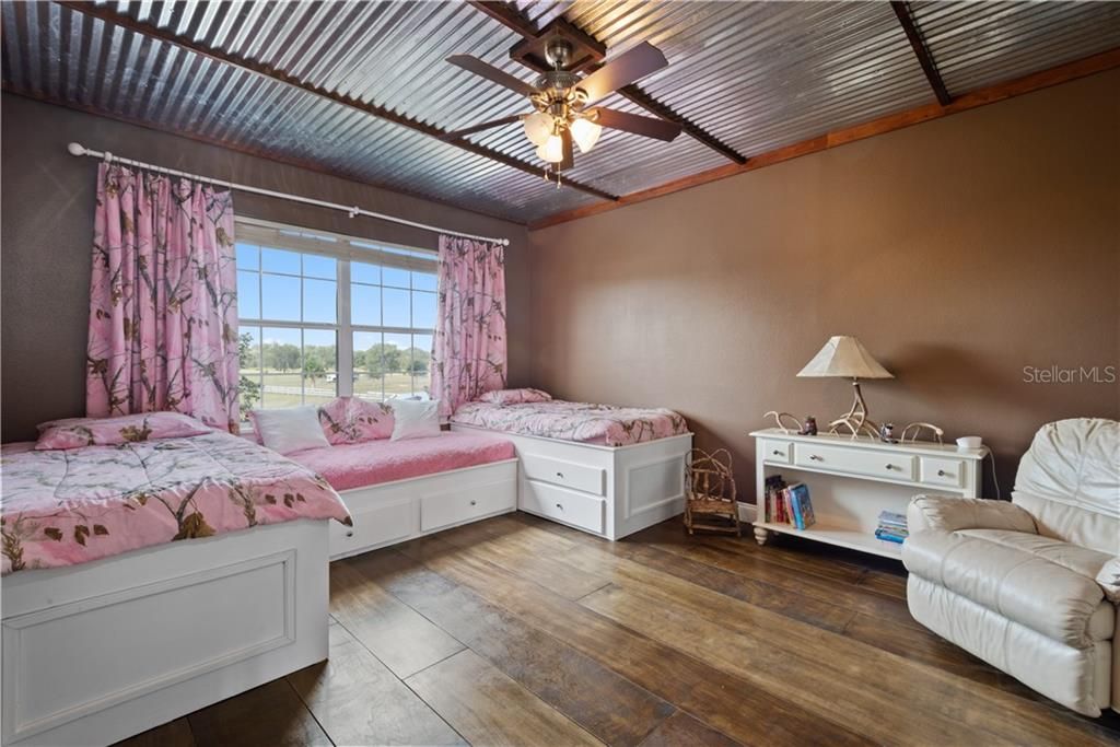 Love this ceiling! A total of 5 BR's, upstairs is this BR 2 of 3 on the second floor, with it's own Bathroom.