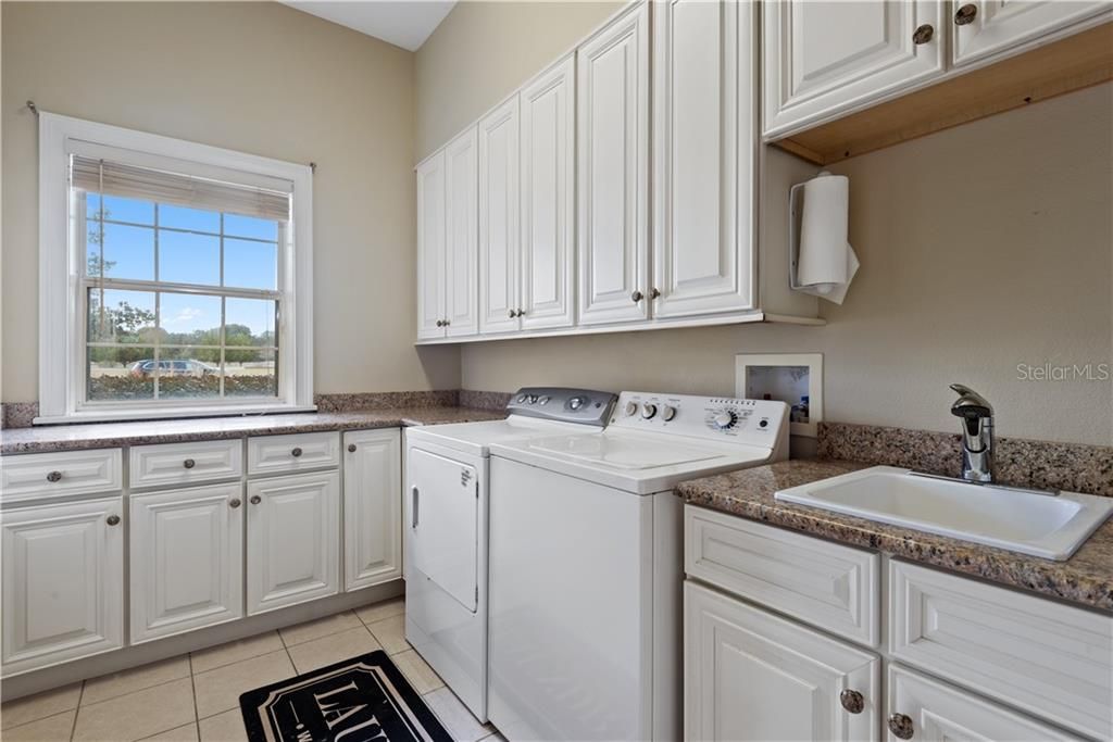 Laundry Room down the hall with laundry chute