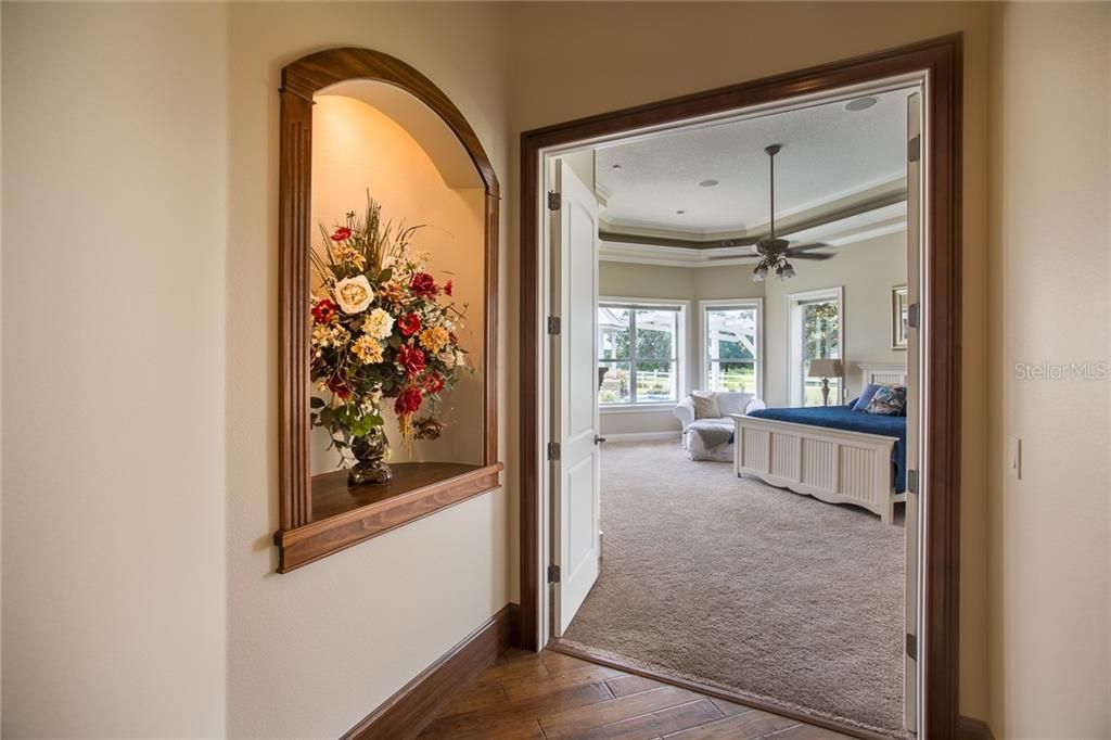 First Floor Master Bedroom wing opens to the pool.