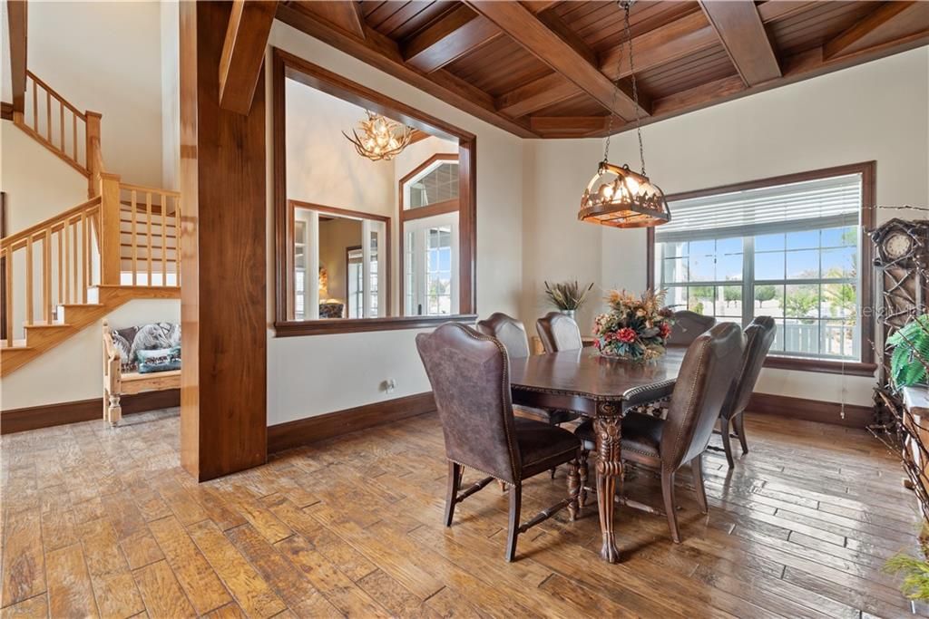 Wonderful attention to detail with massive wood beams, coffered ceiling and rustic fixtures.