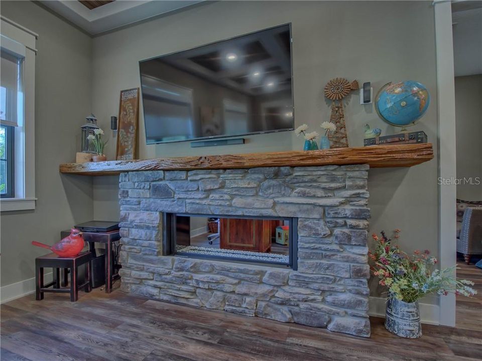 STONE FIREPLACE AND CUSTOM MANTLE