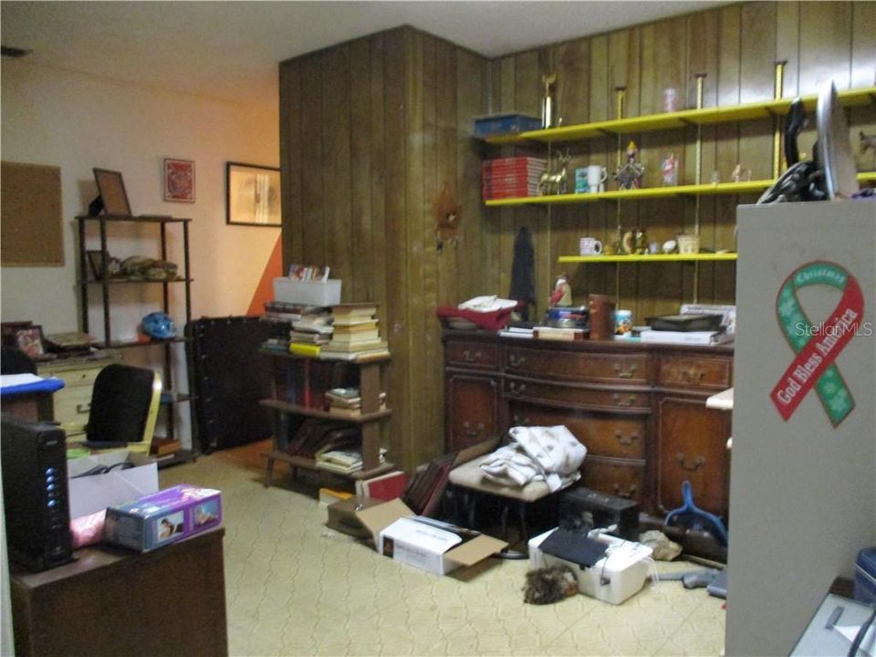 Office, this room has many possibilities.  Owner was a contractor, used for his office. Please excuse clutter, getting ready for an estate sale.