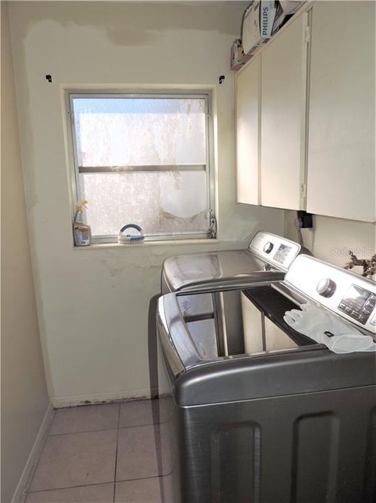 Laundry Room off the Kitchen---Washer & Dryer do not convey