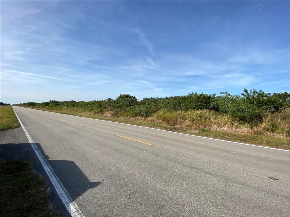 Over 670' of paved road frontage on NW 240th St.(Eagle Island Rd./CR 724)