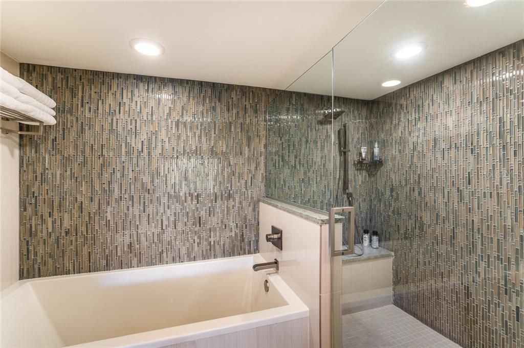 Oversized soaking tub and shower in the master bath