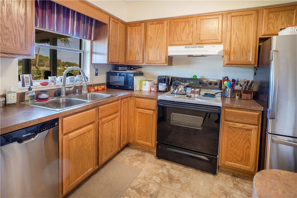 Kitchen is 7x10 with well conditioned appliances and a great view of the golf course from the sink.  Makes it peaceful!