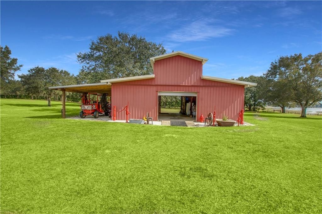 BARN (Built 2002) 36x36, Air conditioned Office 12x12 w/ Cypress wood walls and ceilings, airconditioned Tack room or storage room12x12 w/ Cypress wood walls, Loft, aprox 16x40 lean to, Outside shed with toilet and sink, Cowboy kitchen with sinks refrigerator stainless steel , Gas hot water heater