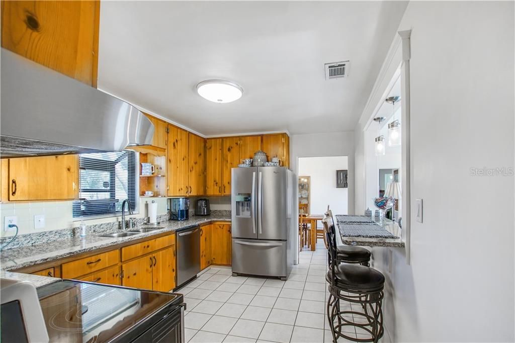 Kitchen - remodeled in 2018 with new granite countertops and appliance.