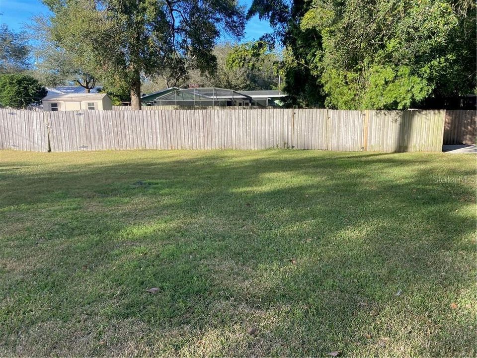 Front of lot, the fence in the middle to be removed at Seller's expense