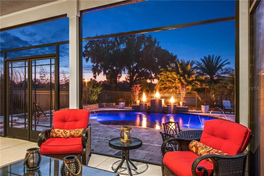 Lanai complete with 2 sets of double doors, framed cage, overlooking pool deck.