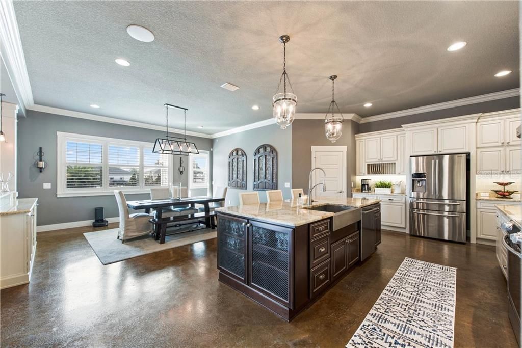 Large dining area will accommodate almost any size table.