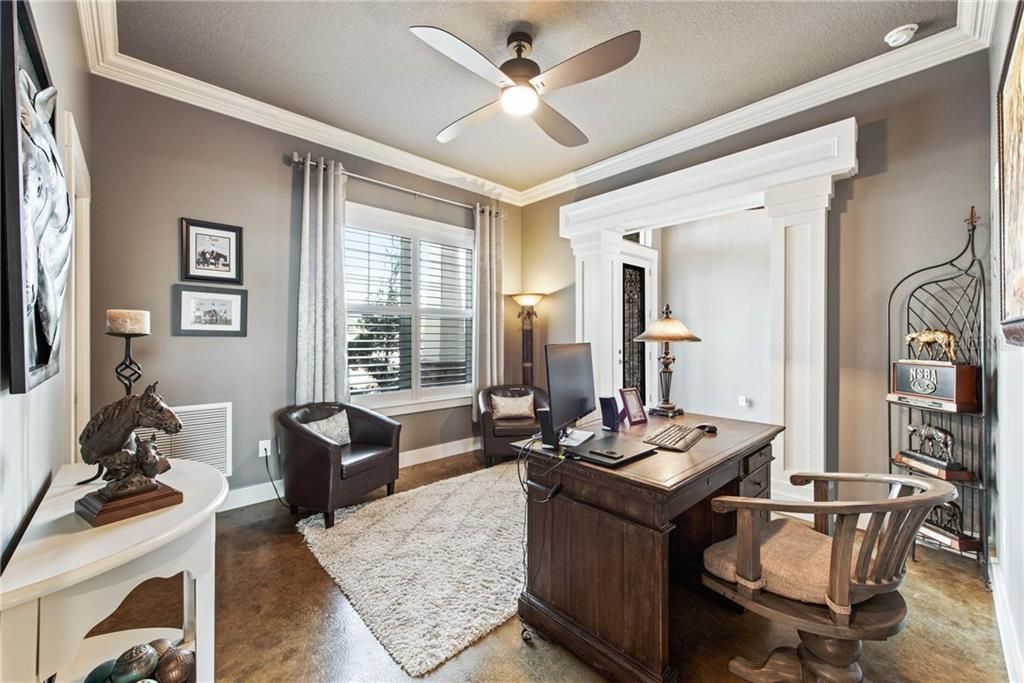Office with crown, walk-in closet and beautiful woodwork!