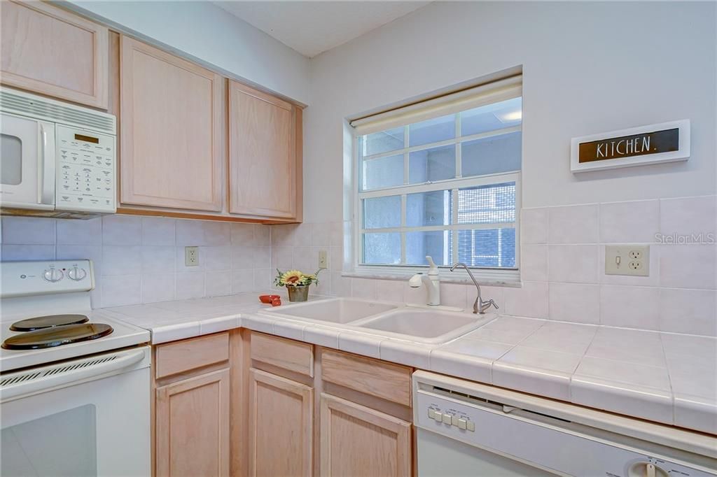 Love this window over the kitchen sink