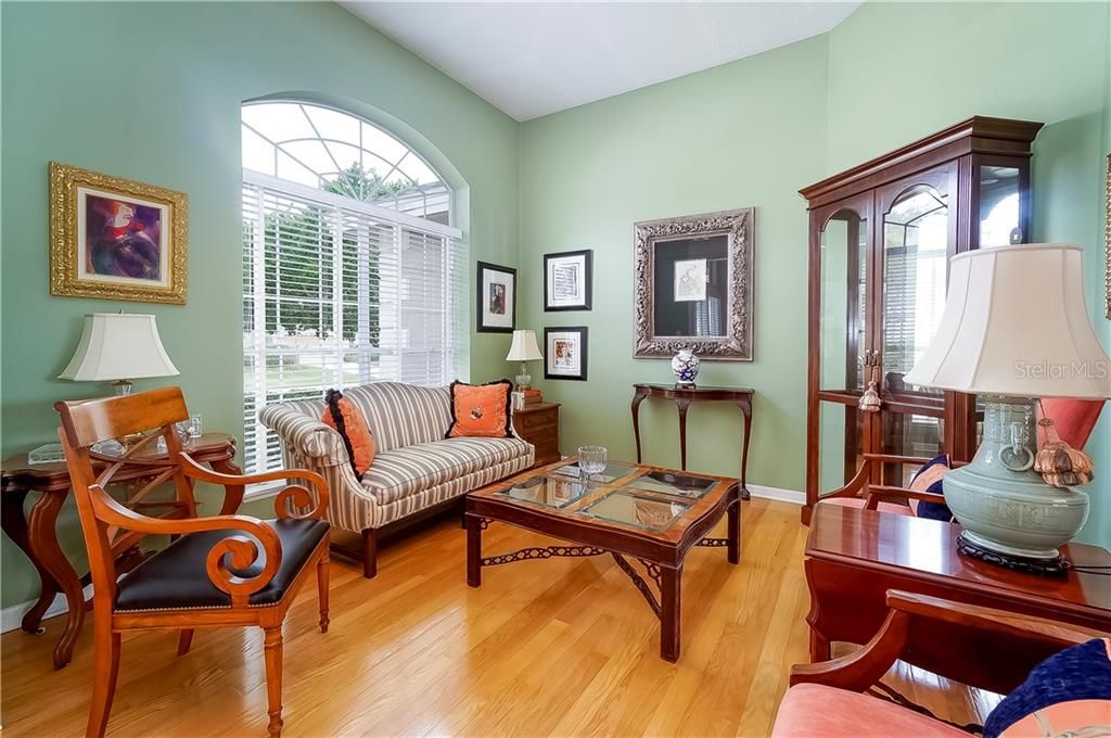 Both the formal living room and formal dining room flank the foyer complimented by the transom windows throughout allowing an abundance of natural light into this open concept home.