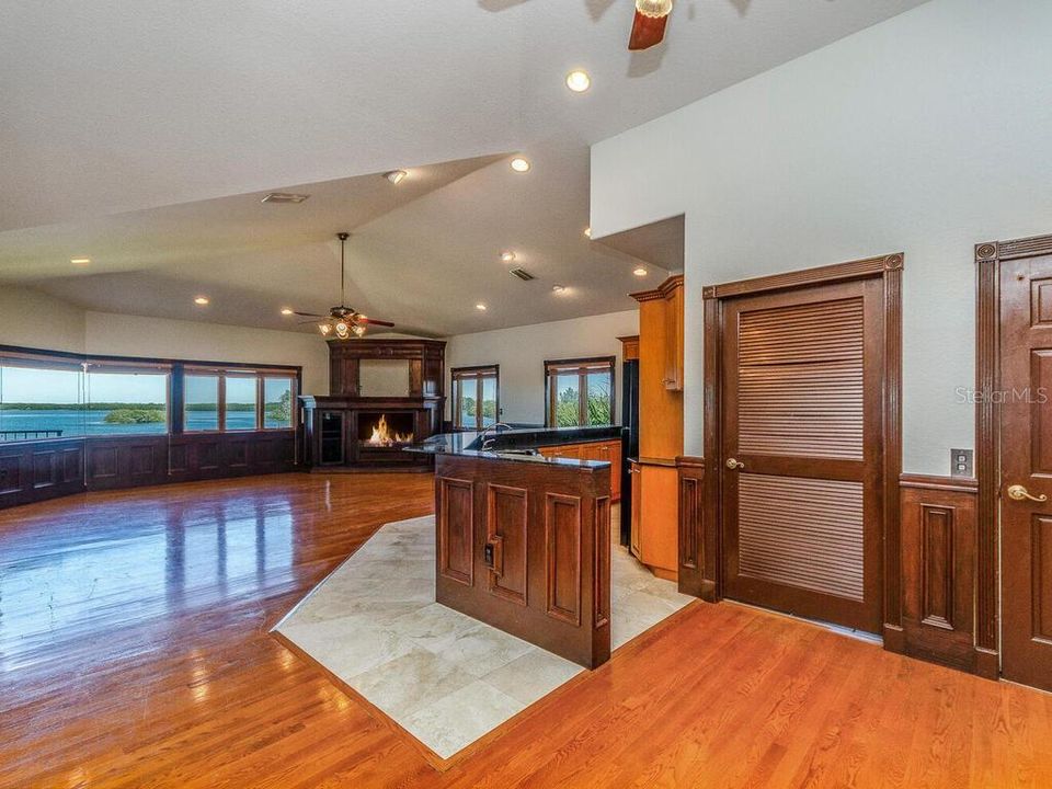 GAMEROOM WITH STUNNING WATER VIEWS ,FULL SECOND KITCHEN AND BUILT IN W/GAS FIREPLACE