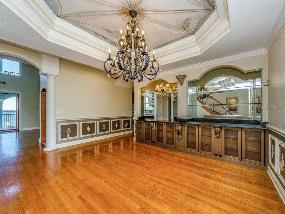 ELEGANT FORMAL DINING ROOM FEATURES BUILT INS AND A BUTLERS SERVING STATION