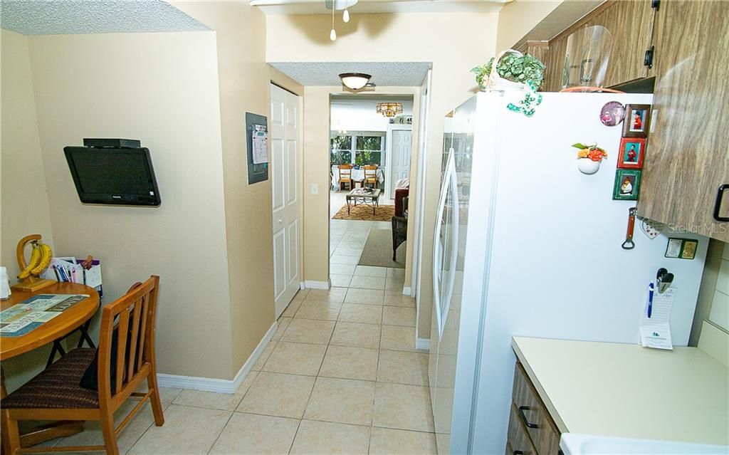 Standing in the kitchen and looking all the way back to the bonus room.  You can see the beautiful garden through the window!