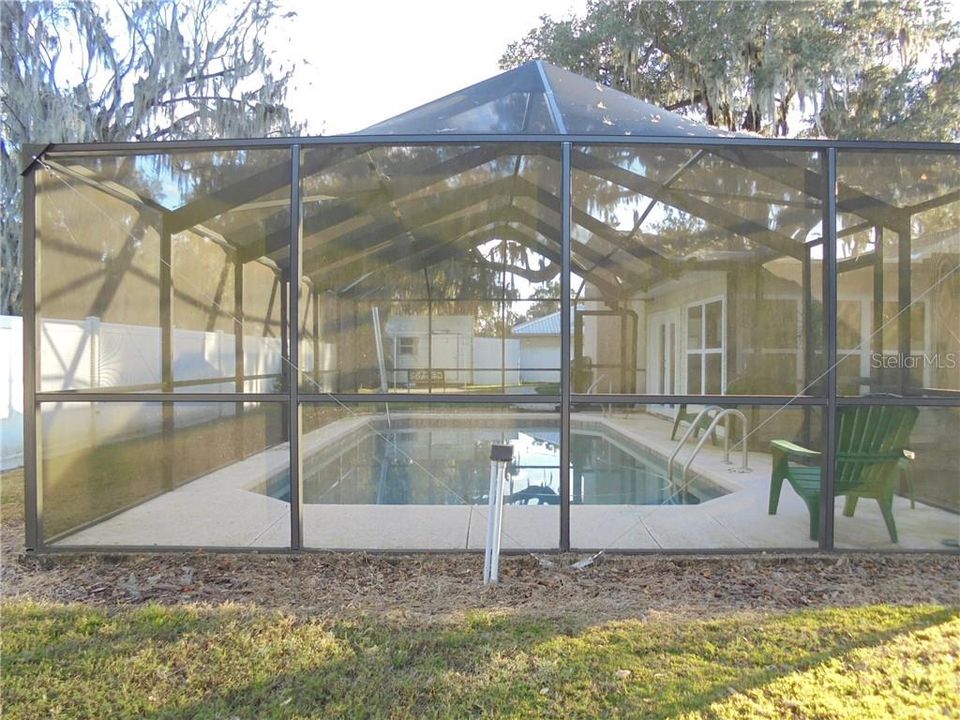 Screened and heated pool.