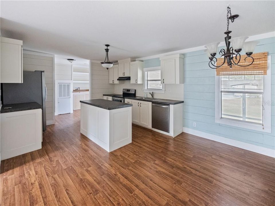 Open kitchen with stainless steal appliances