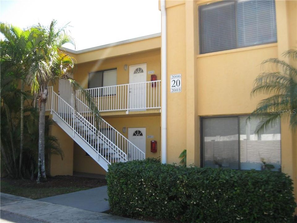 GARDEN WALK BLDG. #20, #2002 IS DIRECTLY BEHIND THE STAIRS ON THE FIRST FLOOR.