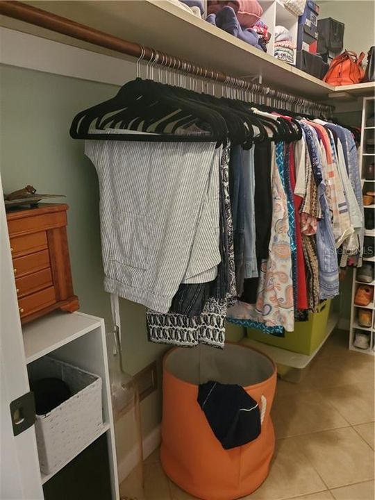 A closer look at the ample storage space in the master closet.