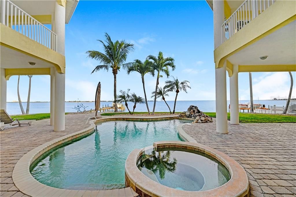 Relax in the Pool & Hot Tub While Looking Out to the River