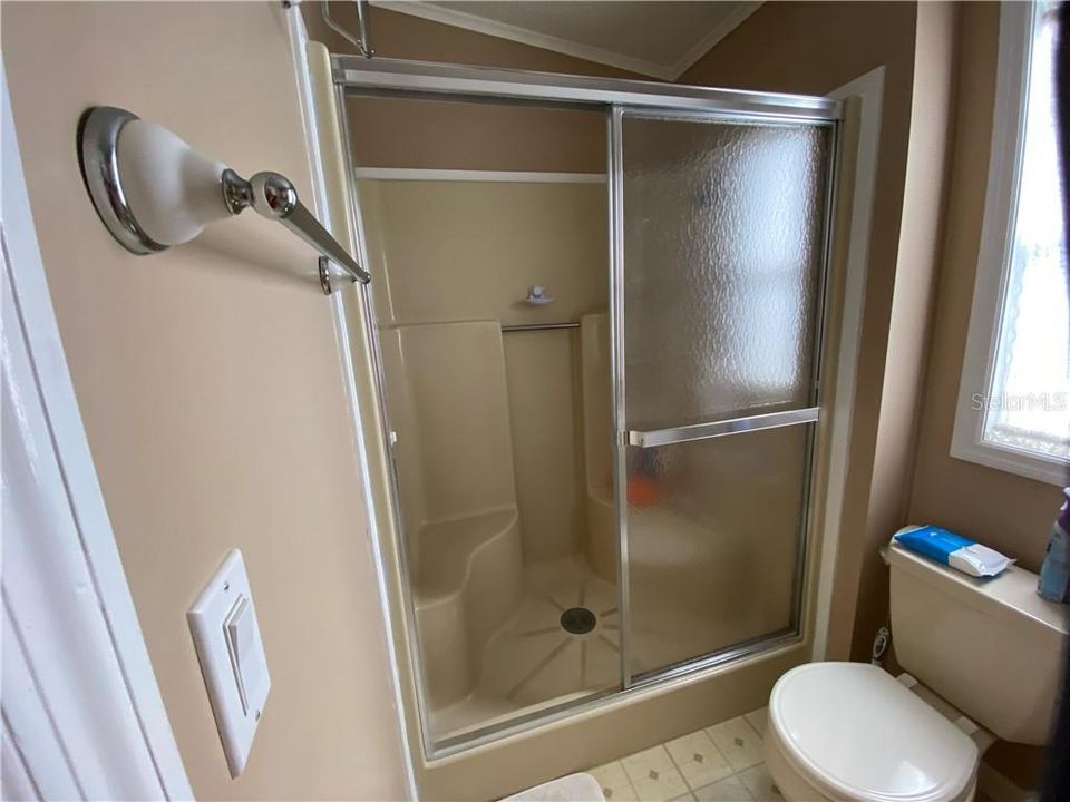 LARGE SHOWER WITH SEAT IN MASTER BATH