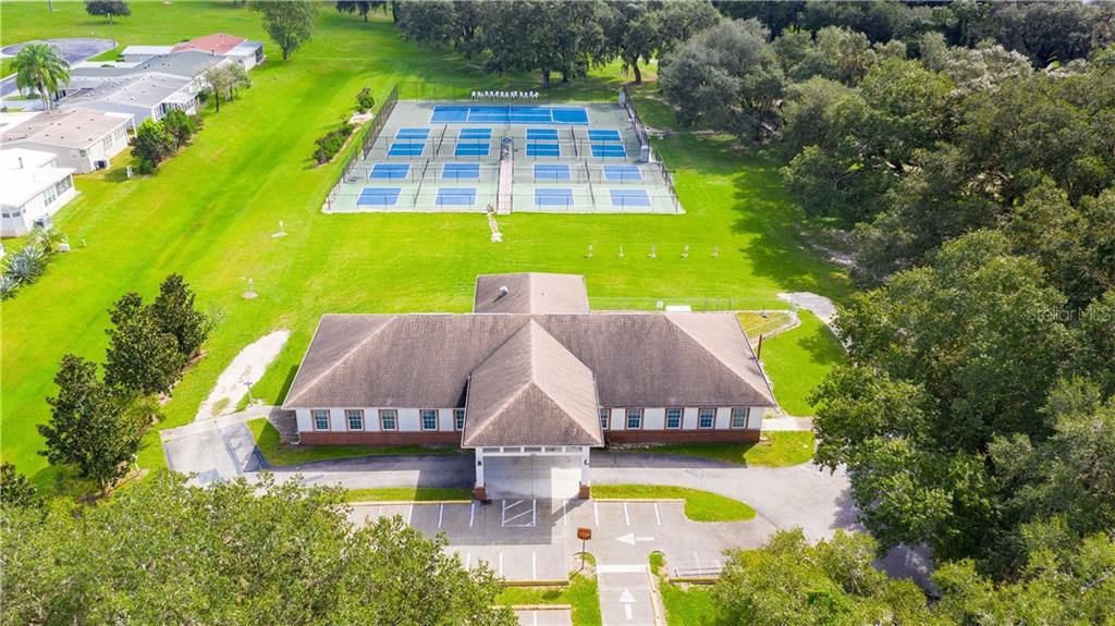 Community game club house and pickleball/tennis courts.