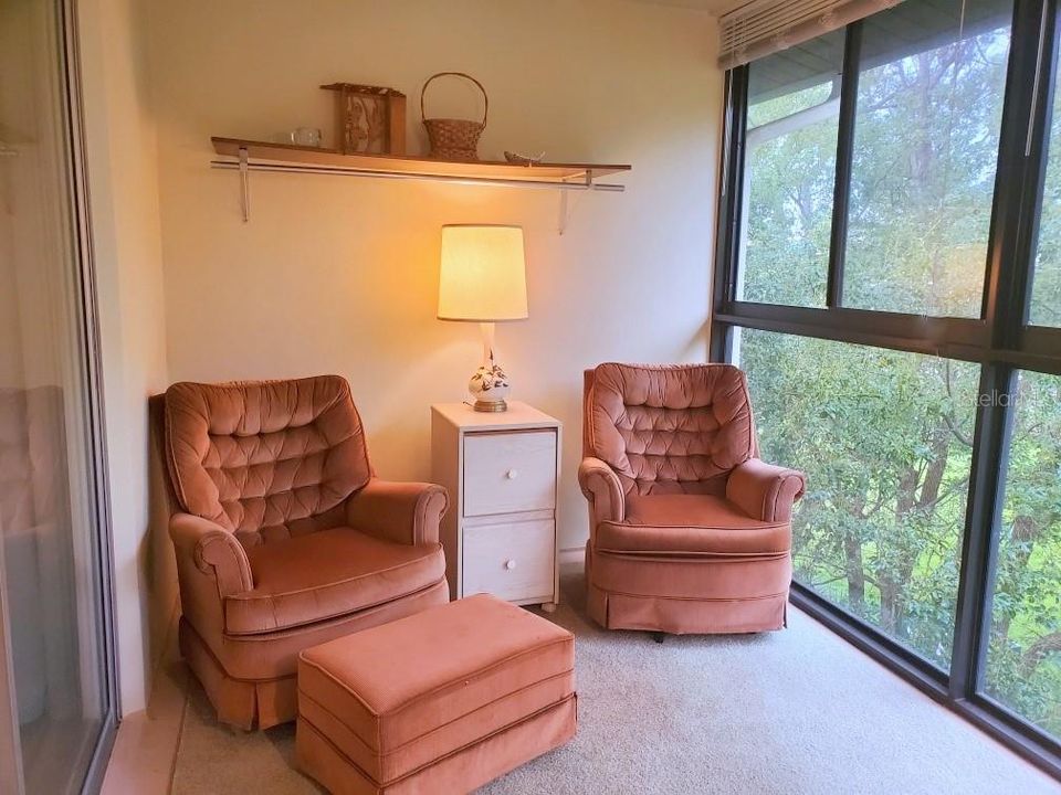 Enclosed lanai has newer windows and serves as an extra room not included in the interior square feet.