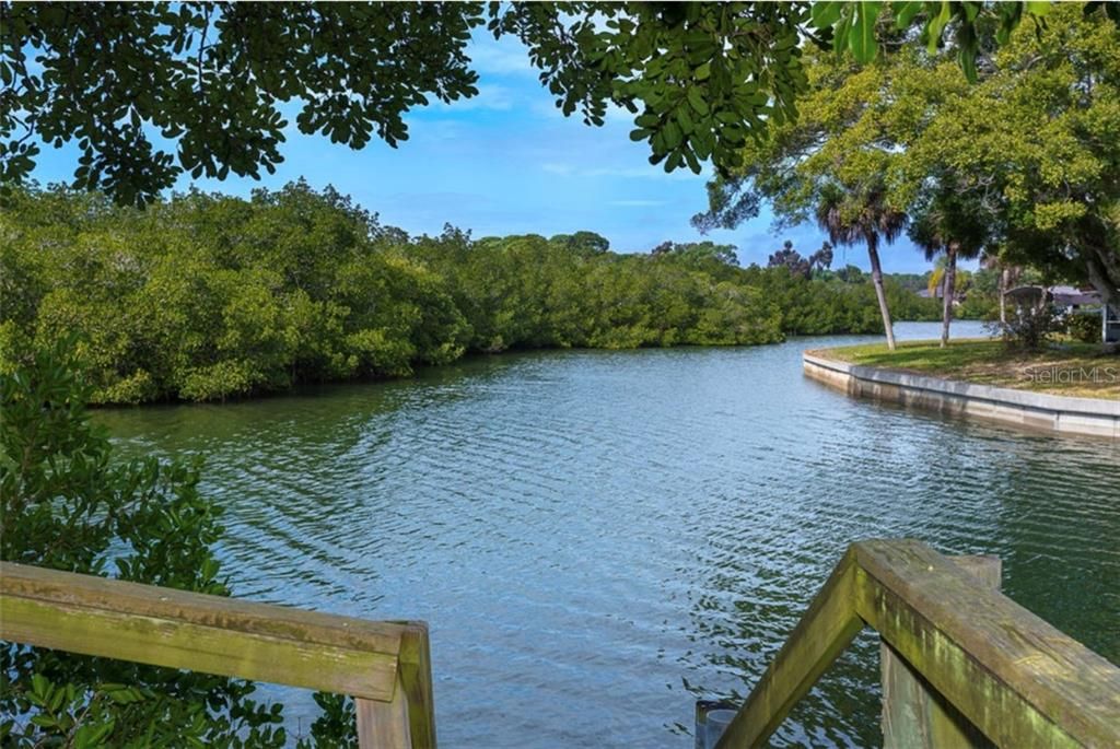 Enjoy the tranquil waters behind the home and keep your boat in your own back yard!