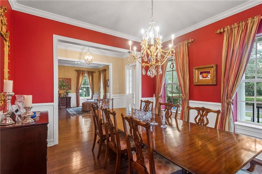 Beautiful dining room w/wainscoting and lake view