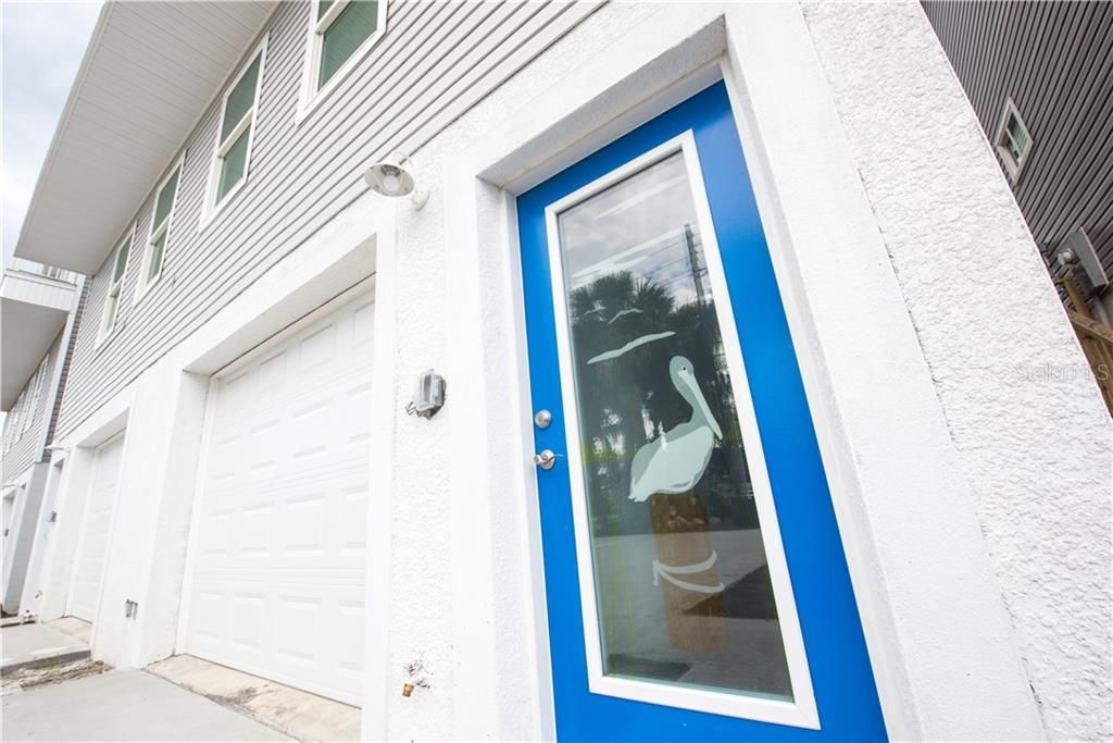 Custom front door welcomes you to Pelican Watch. A Ring Doorbell is a standard for each unit.
